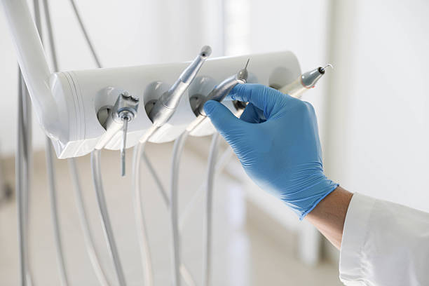 Professional Tooth Extraction technician working in Pleasant Garden, NC